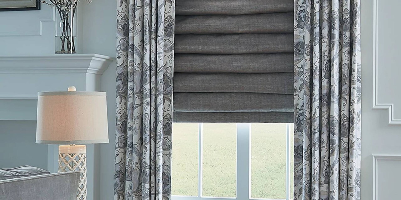 Hunter Douglas Carole Fabrics™ Custom Drapes layered with roman shades near Mount Pleasant, South Carolina (SC)