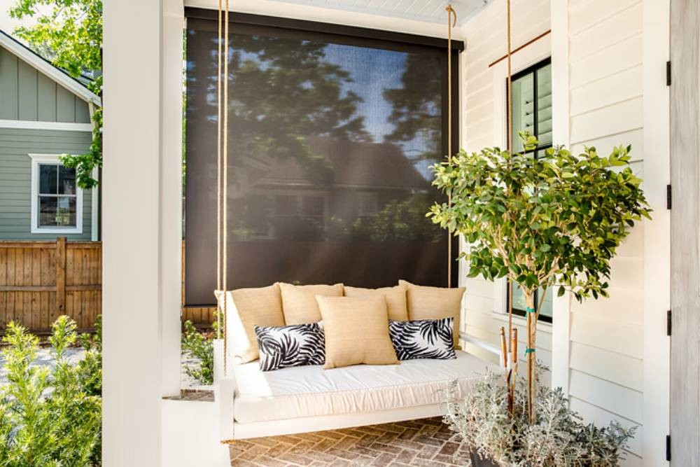Modern covered porch featuring outdoor patio shades near Mount Pleasant, SC